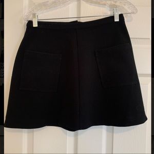 Black mini skirt with pockets
